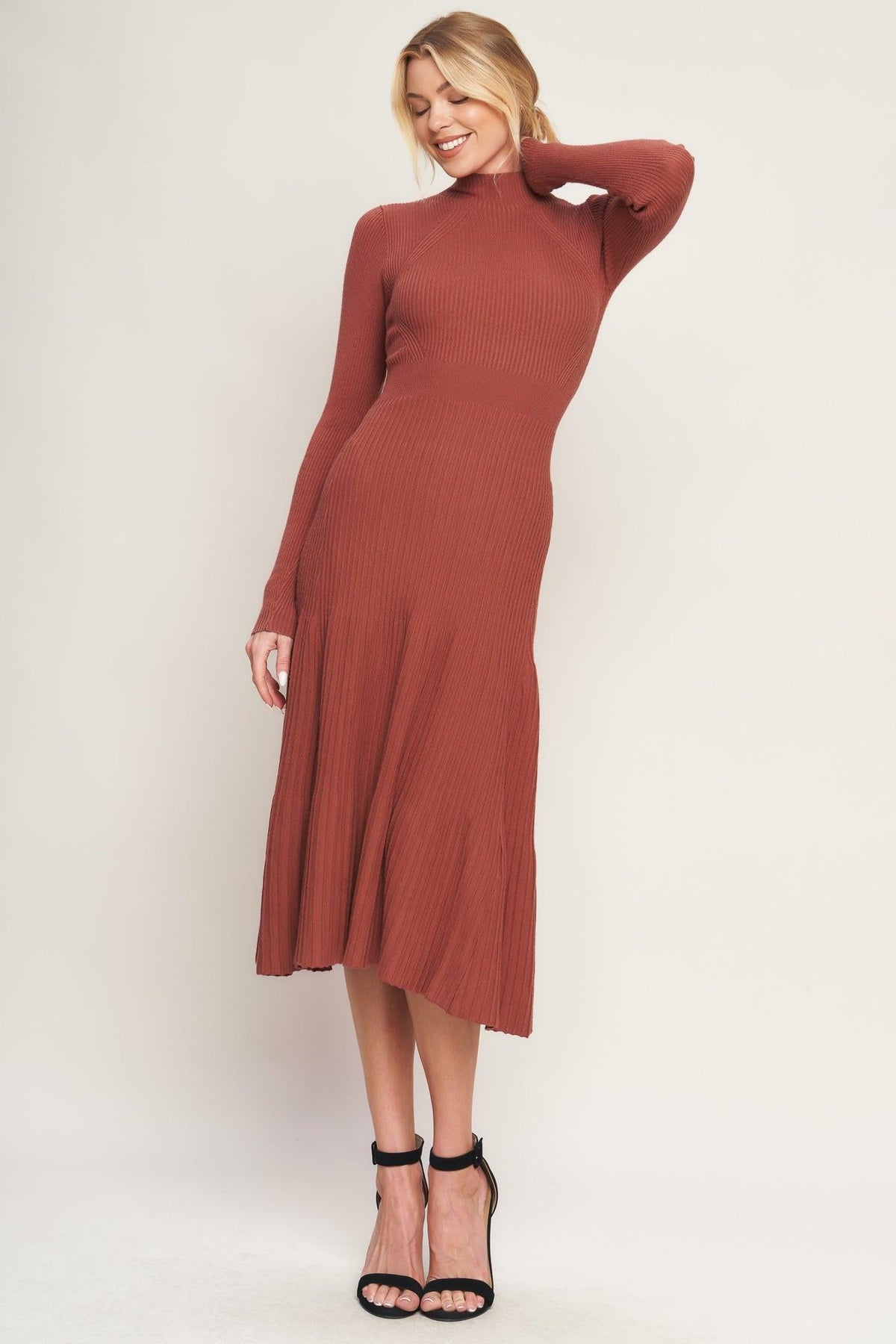 a woman in a brown dress