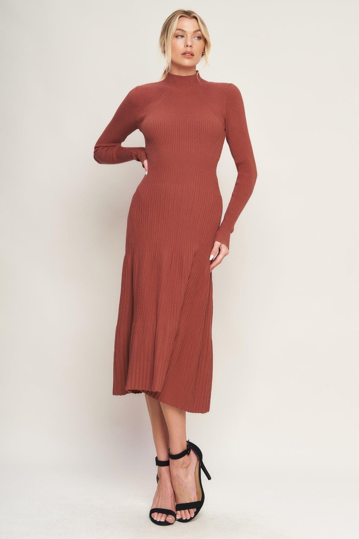 a woman in a long red dress