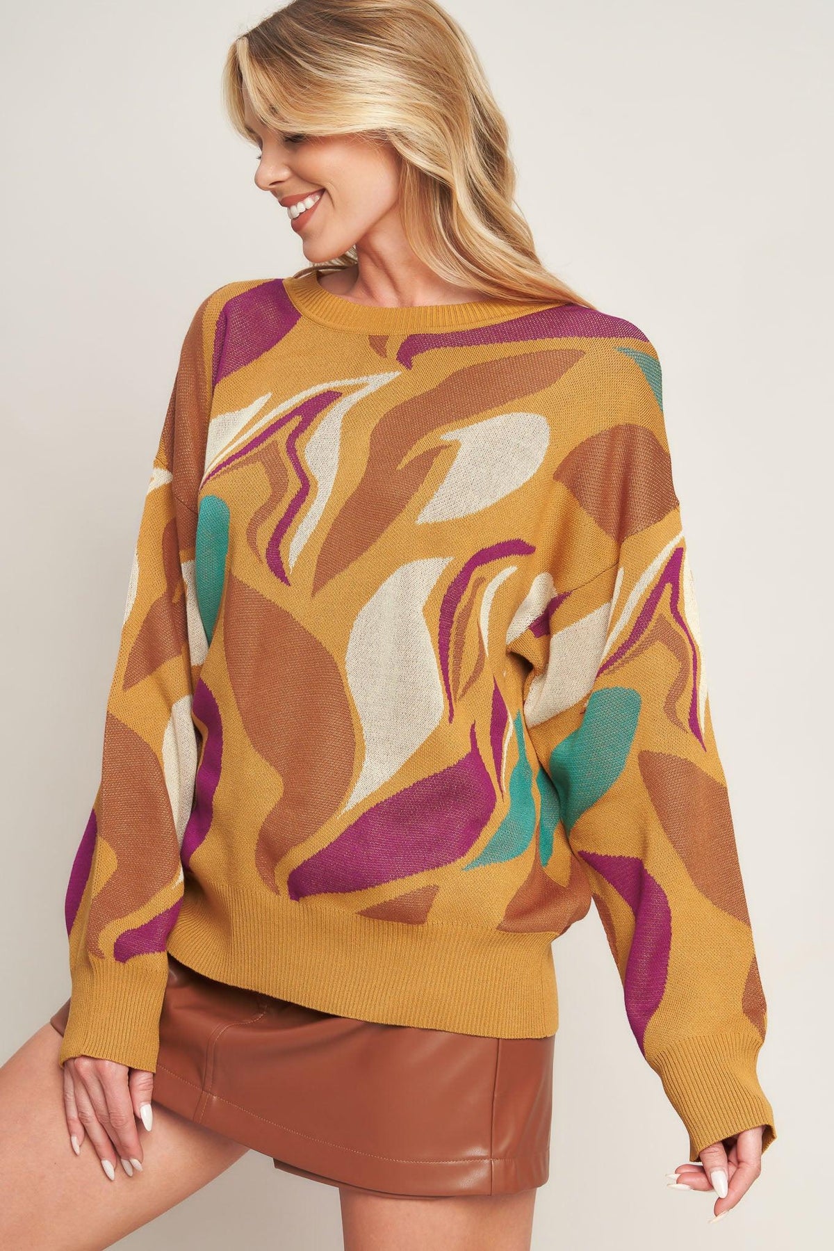 a woman in a sweater