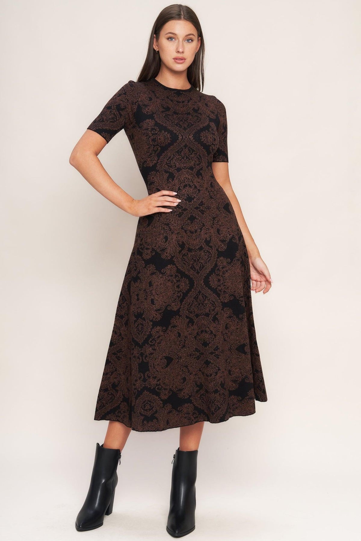 a woman in a brown dress
