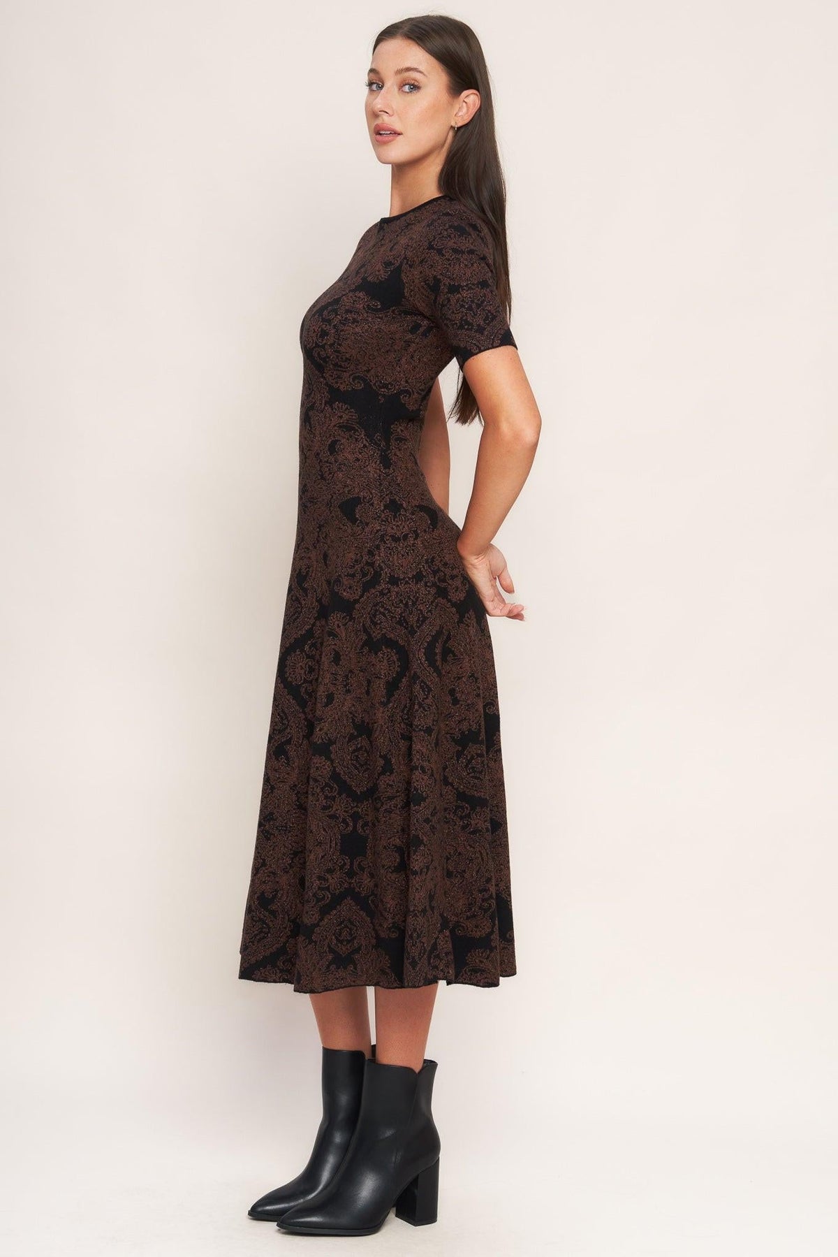 a woman in a long dress