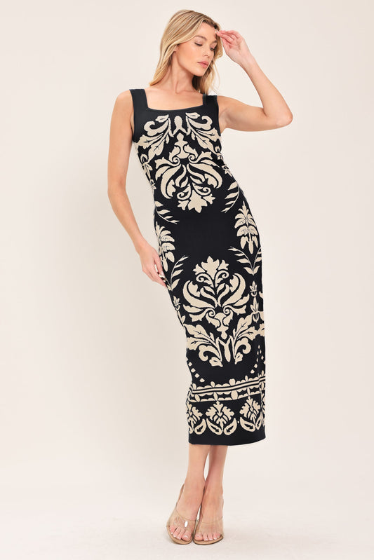 a woman in a black and white dress