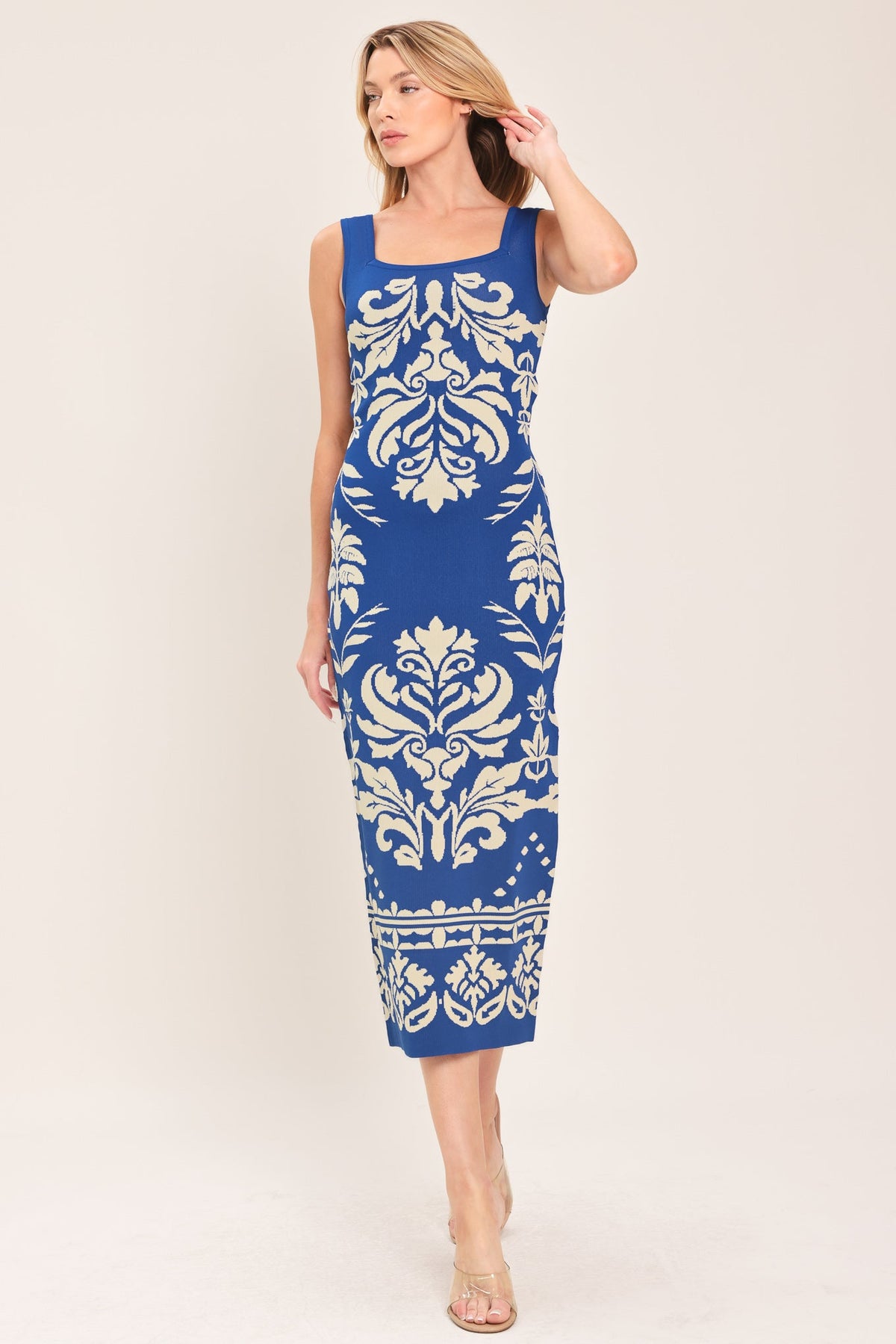 a woman in a blue dress