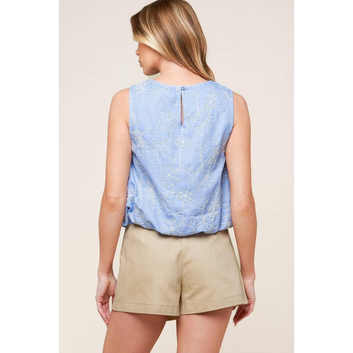 a woman in a blue shirt