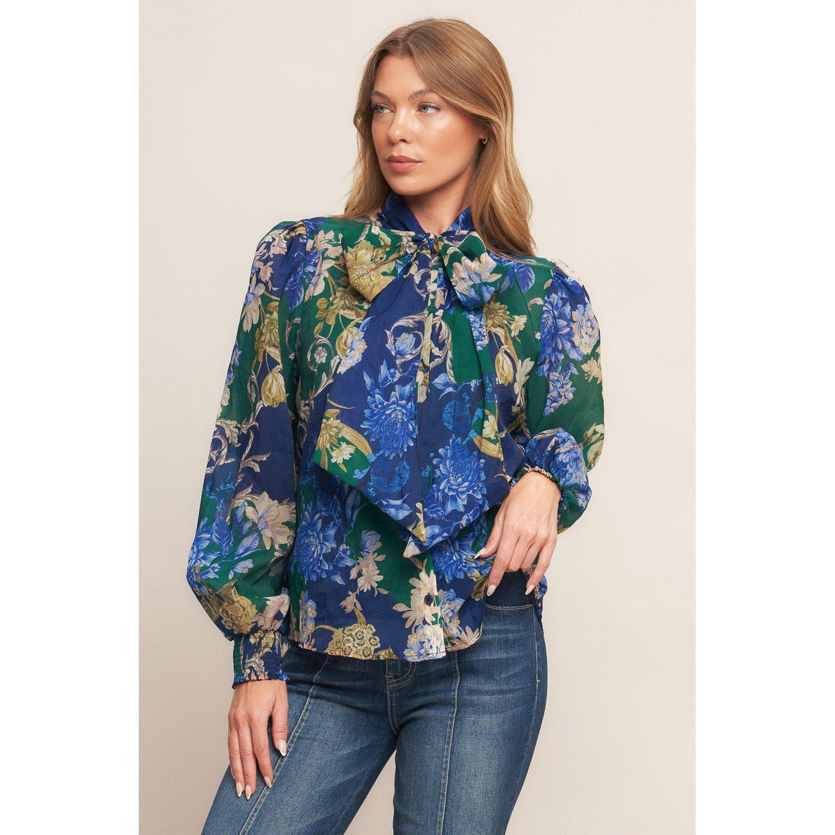 a woman in a floral shirt