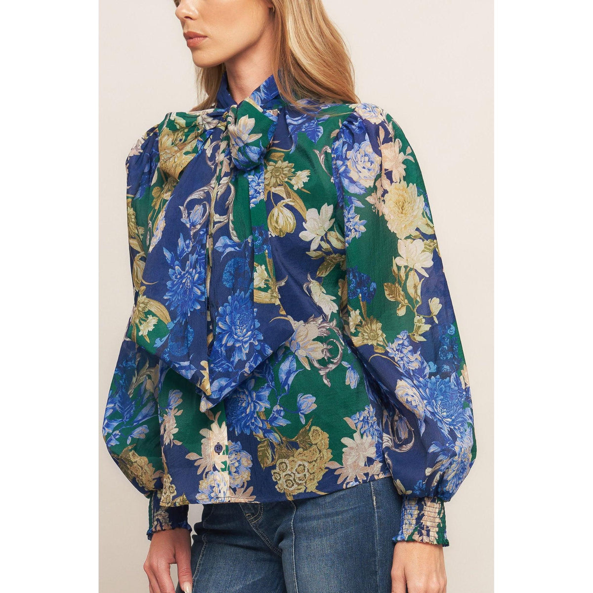 a woman in a floral shirt