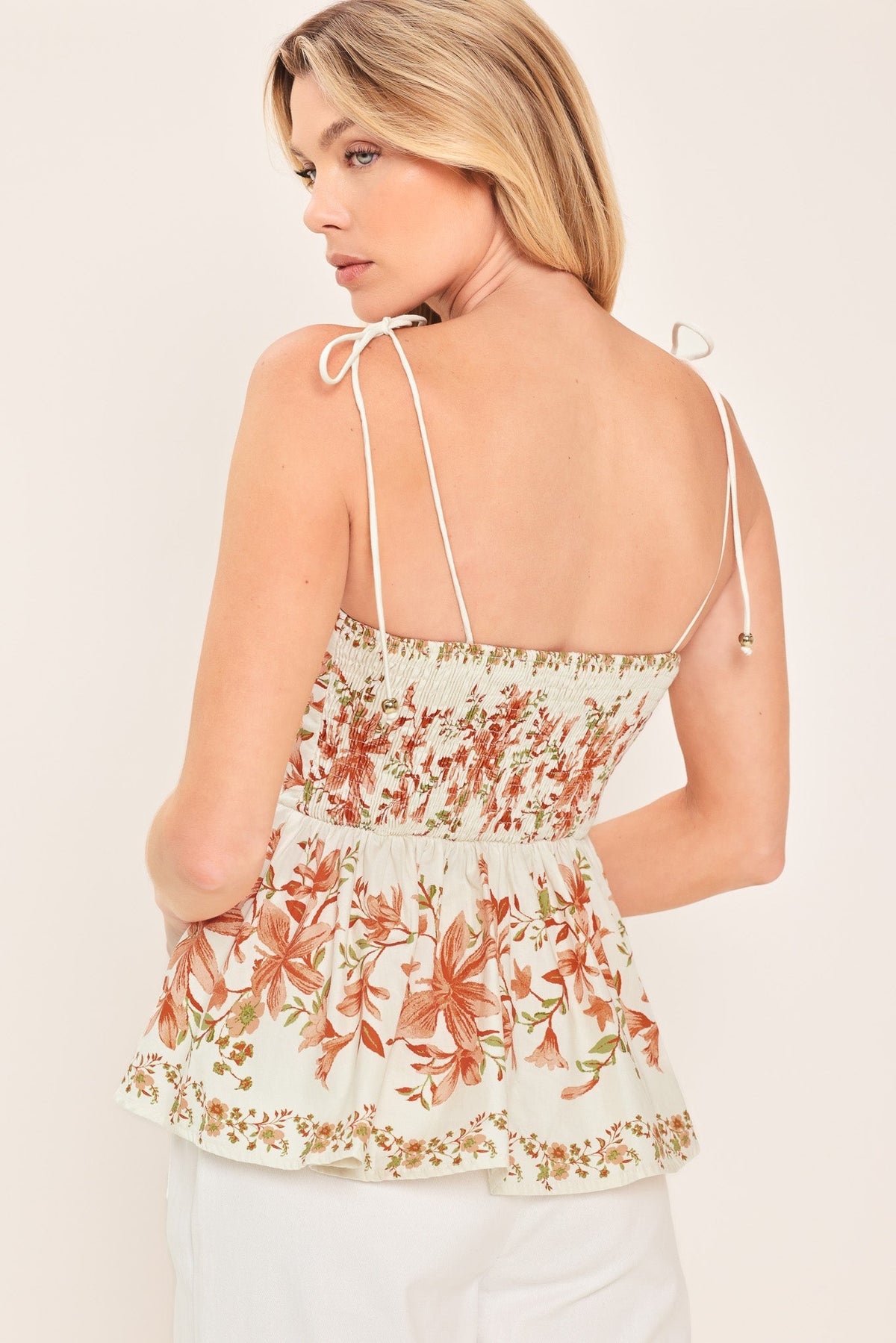 a woman in a floral dress