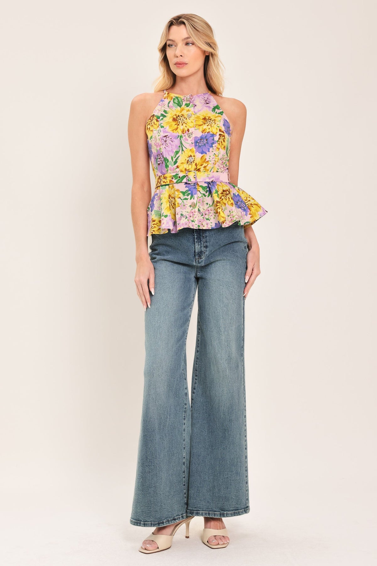a woman in a floral top