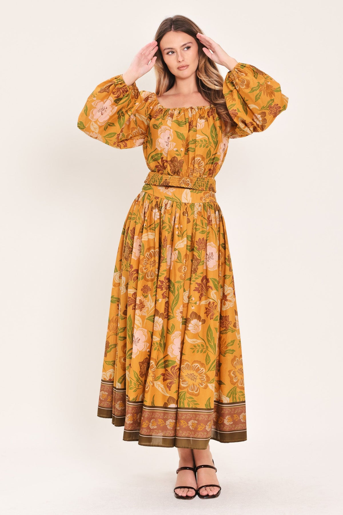 a woman in a yellow dress