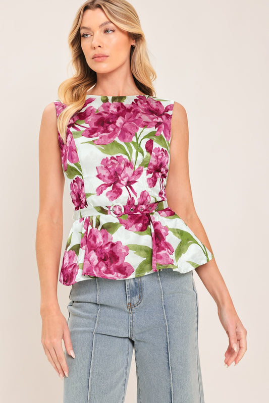 a woman in a floral top