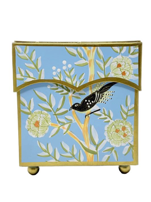 a blue box with a bird on it