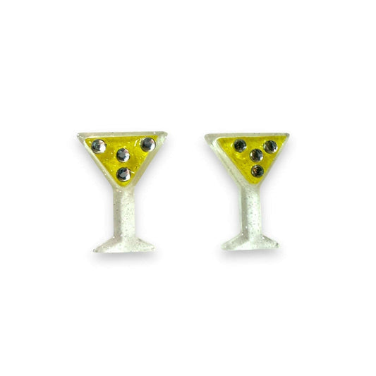 a pair of yellow and white earrings