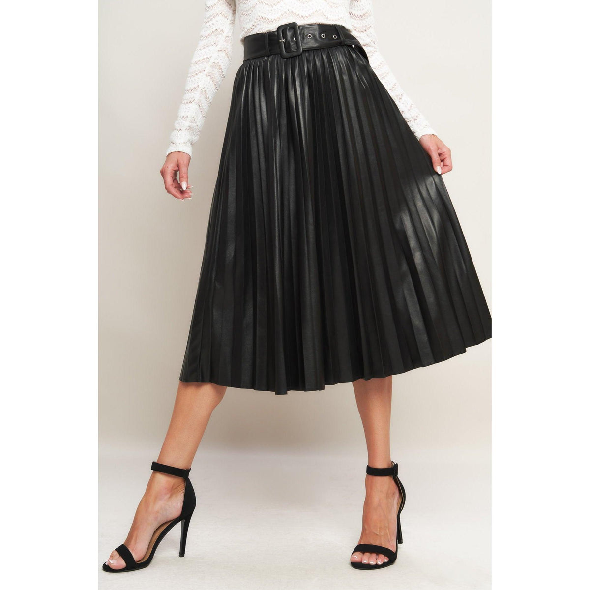 a woman wearing a black skirt