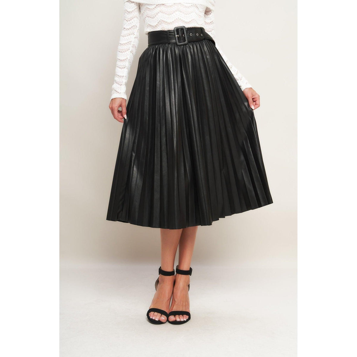 a woman wearing a black skirt
