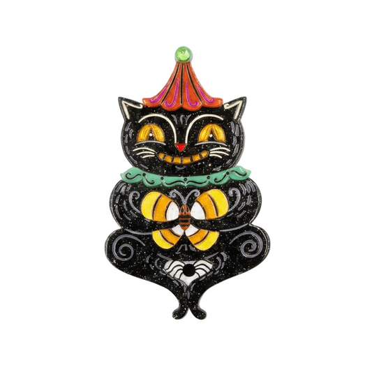 a black cat with yellow eyes and a bee