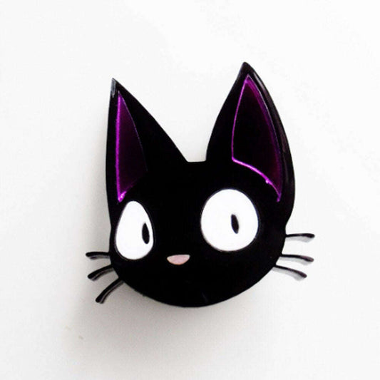 a black cat with purple ears