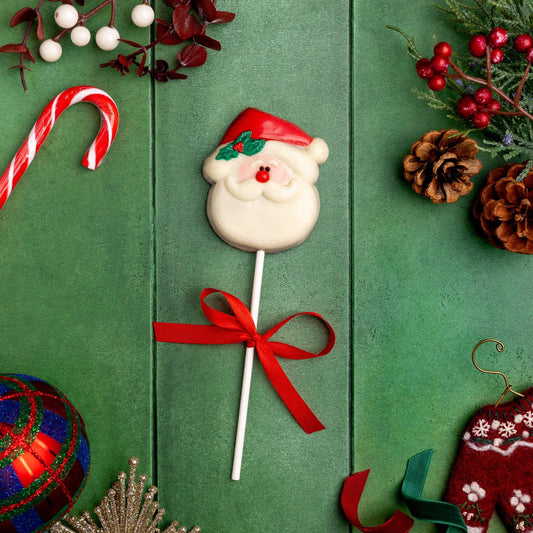 a lollipop with a red bow and decorations