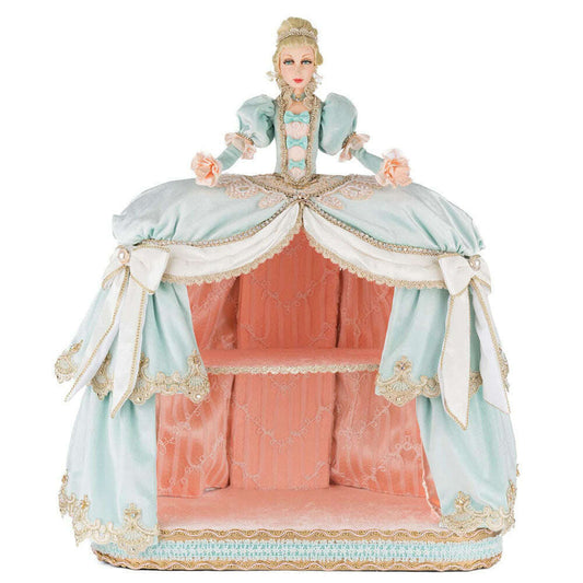 a doll in a dress
