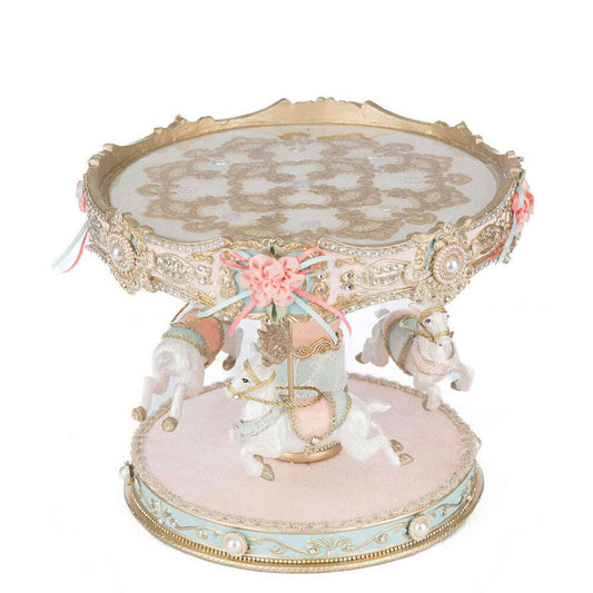a carousel with horses on top