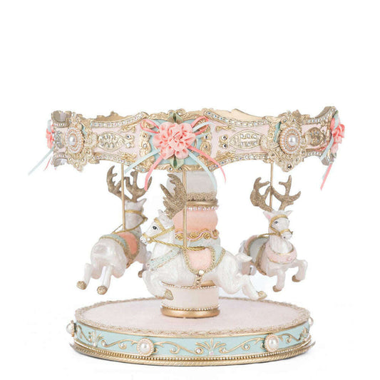 a carousel with horses and flowers