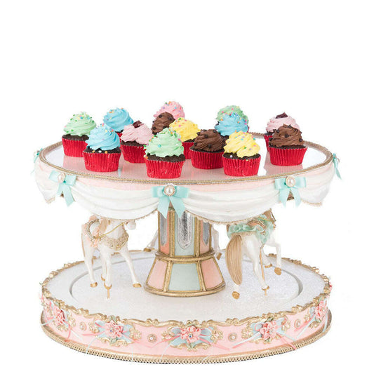 a cake stand with cupcakes on it
