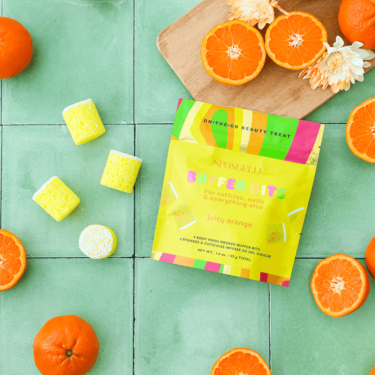a group of oranges and a packet of candy