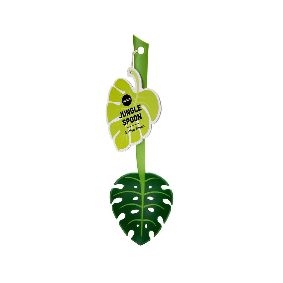 a green leaf with a tag on it