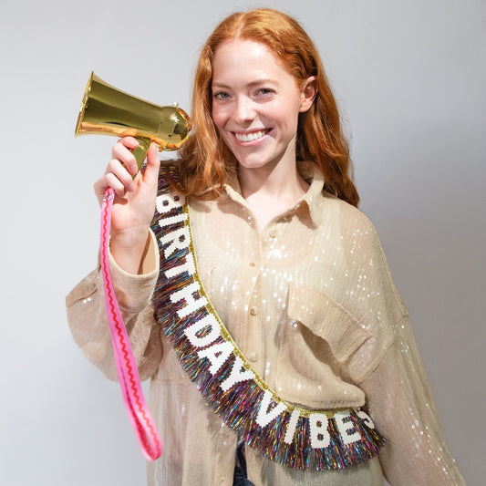 a woman holding a megaphone