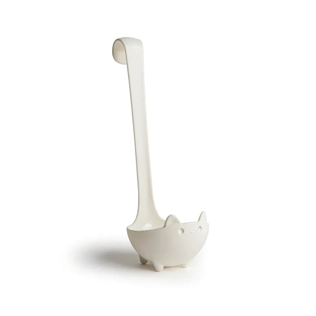 a white ladle with a long handle