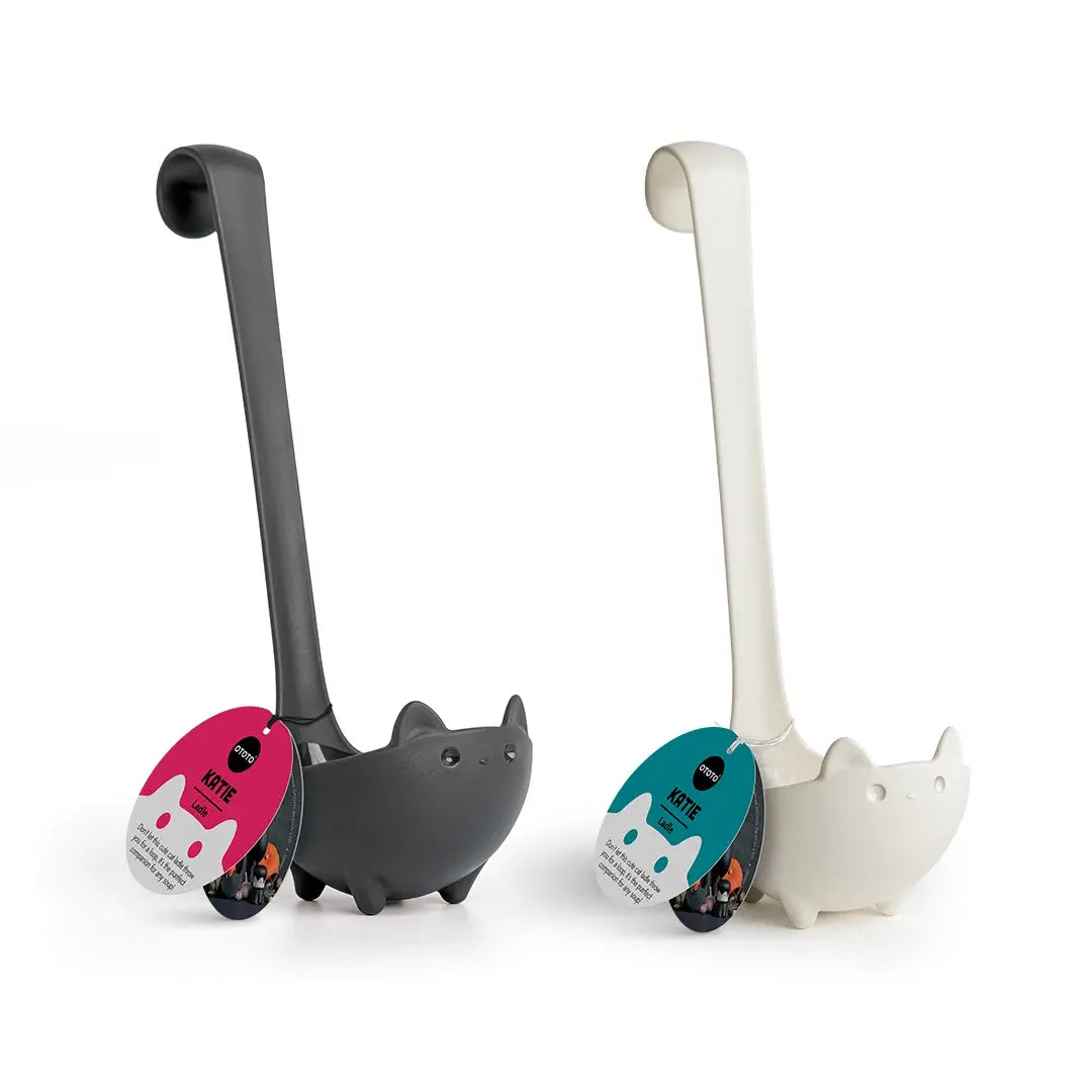 a pair of plastic ladles
