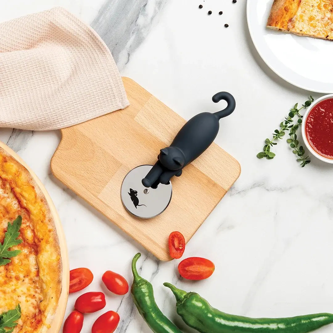 a pizza with a pizza cutter