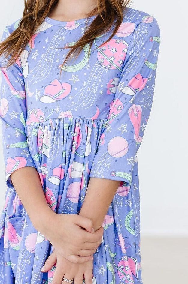 a girl wearing a dress