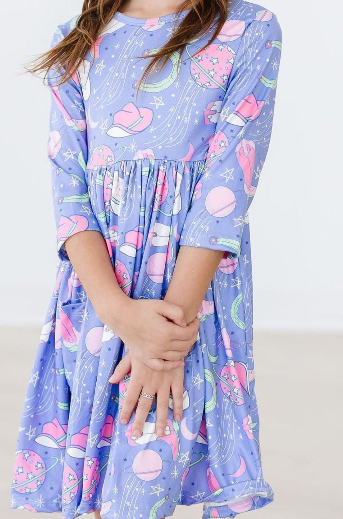 a girl wearing a dress