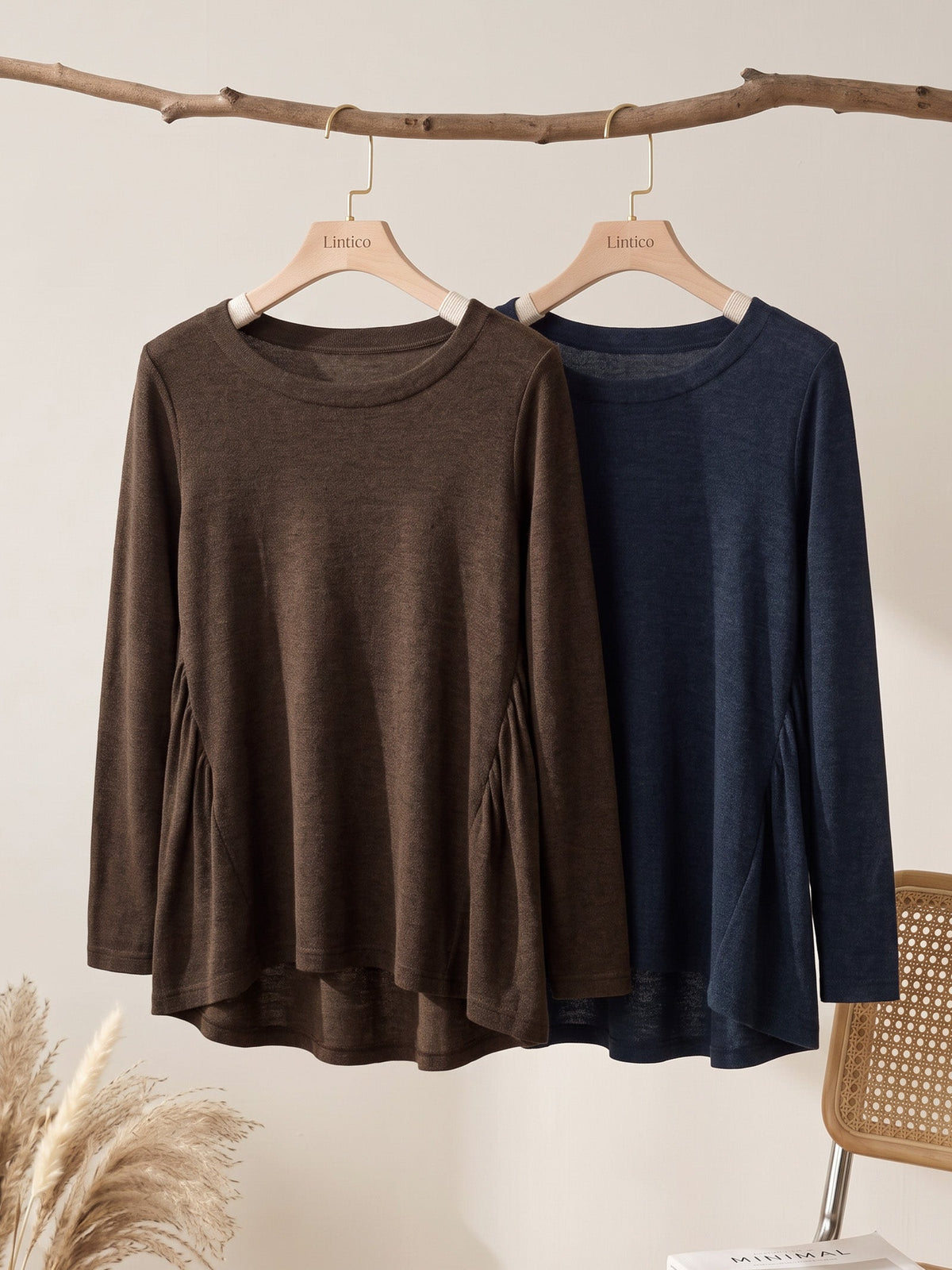 a pair of long sleeved shirts on swingers
