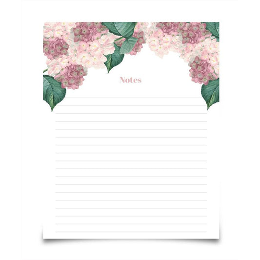 a notepad with flowers and leaves