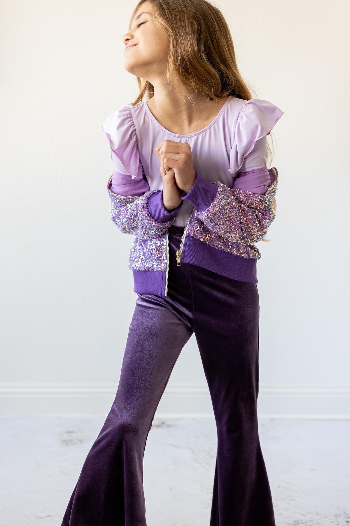 a girl in purple outfit