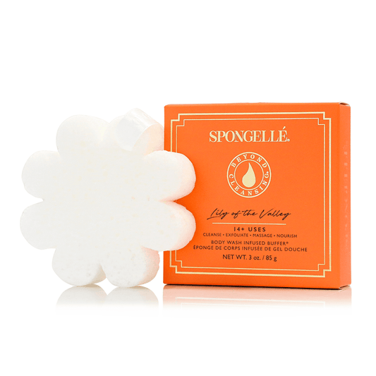 a white sponge next to a box