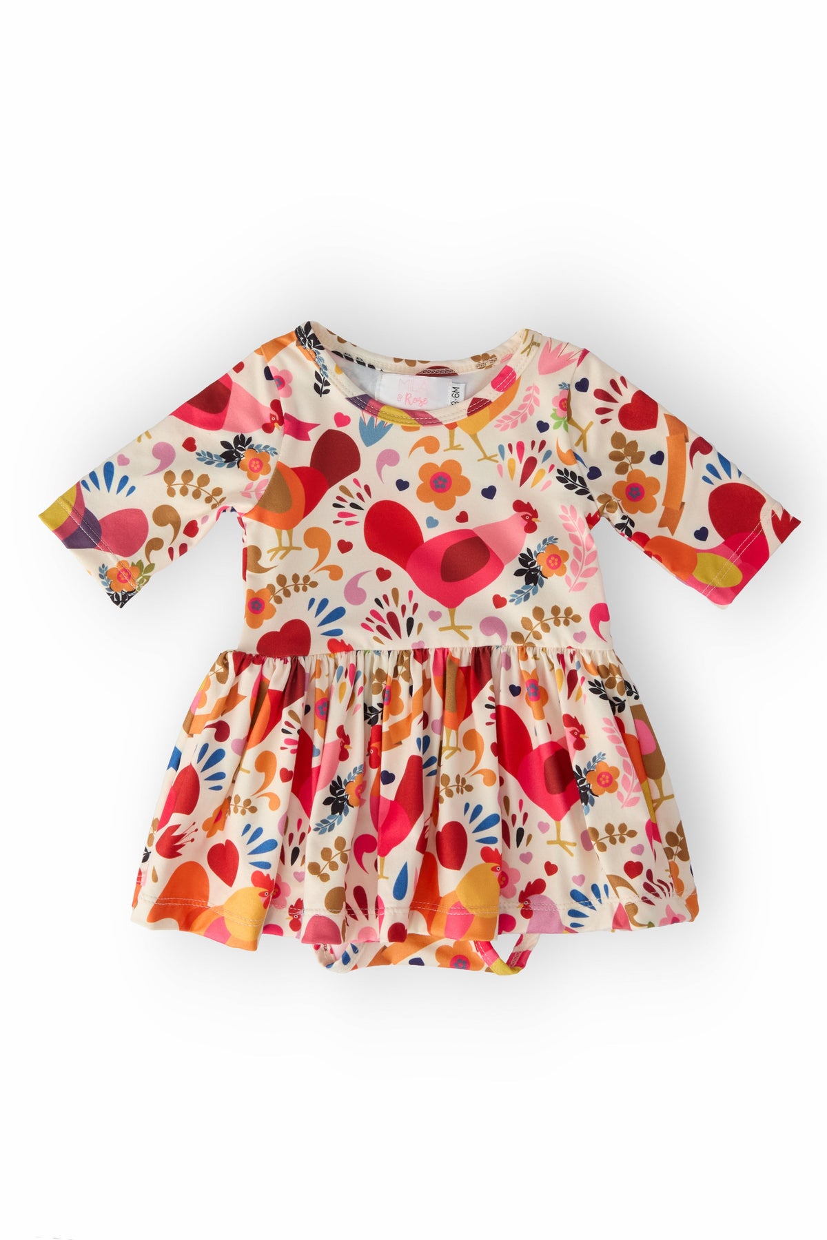 a baby dress with a pattern on it