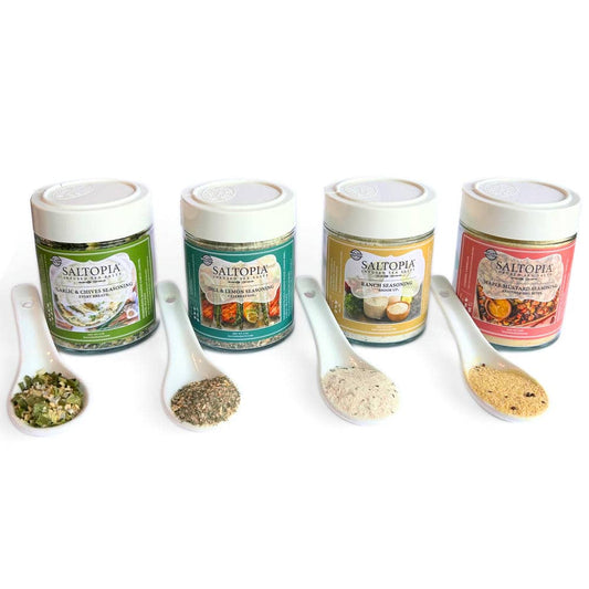 a group of containers with different spices in them