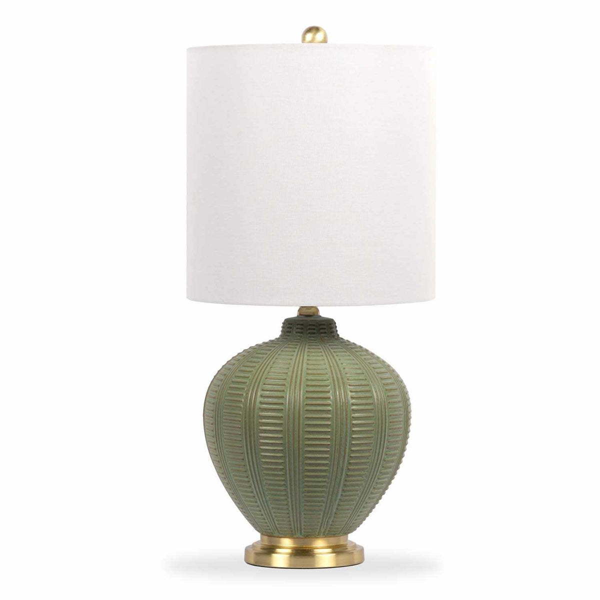 a green and gold lamp