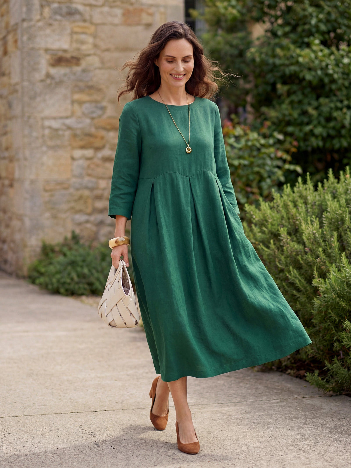 a woman in a green dress