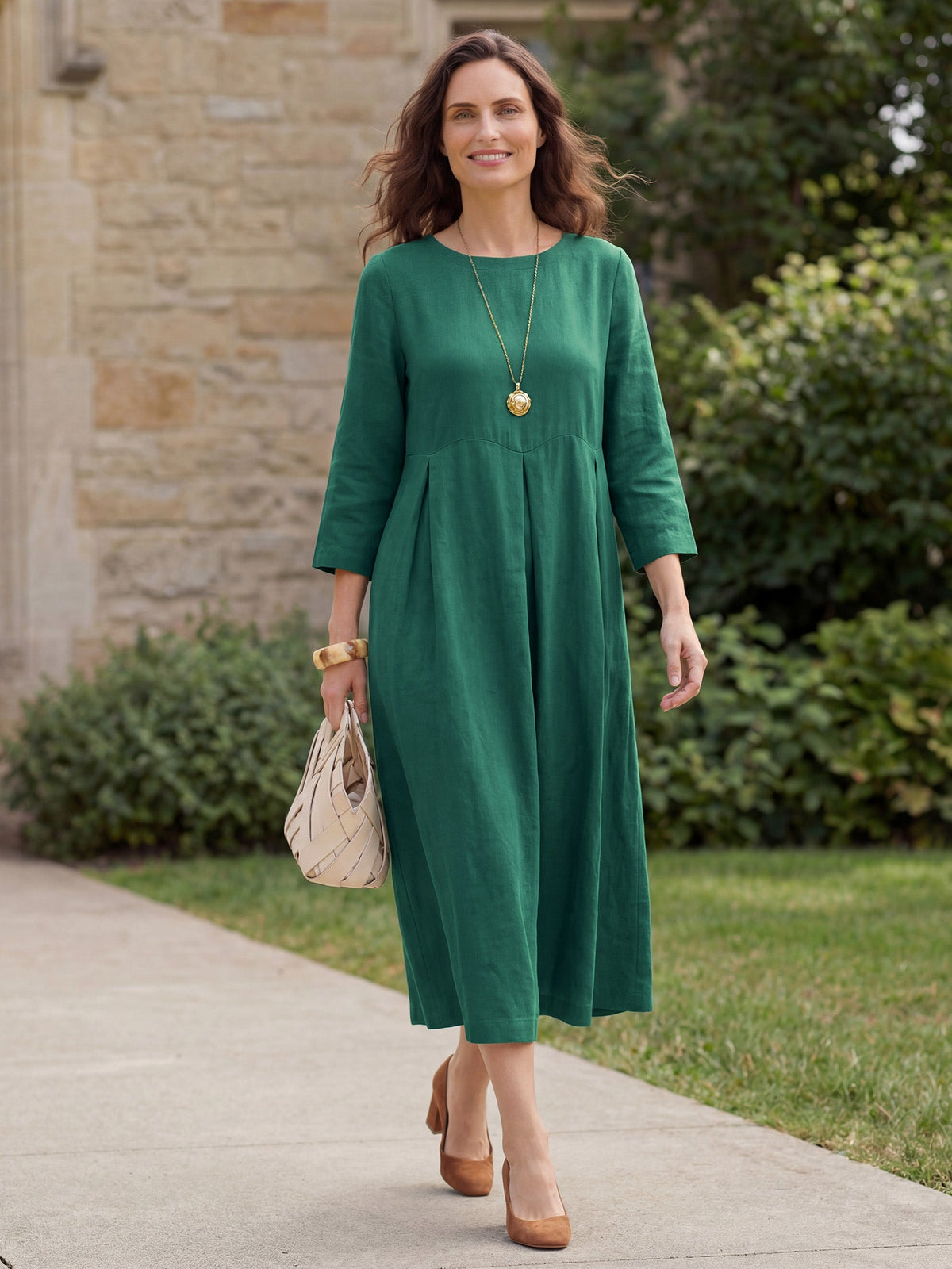 a woman in a green dress