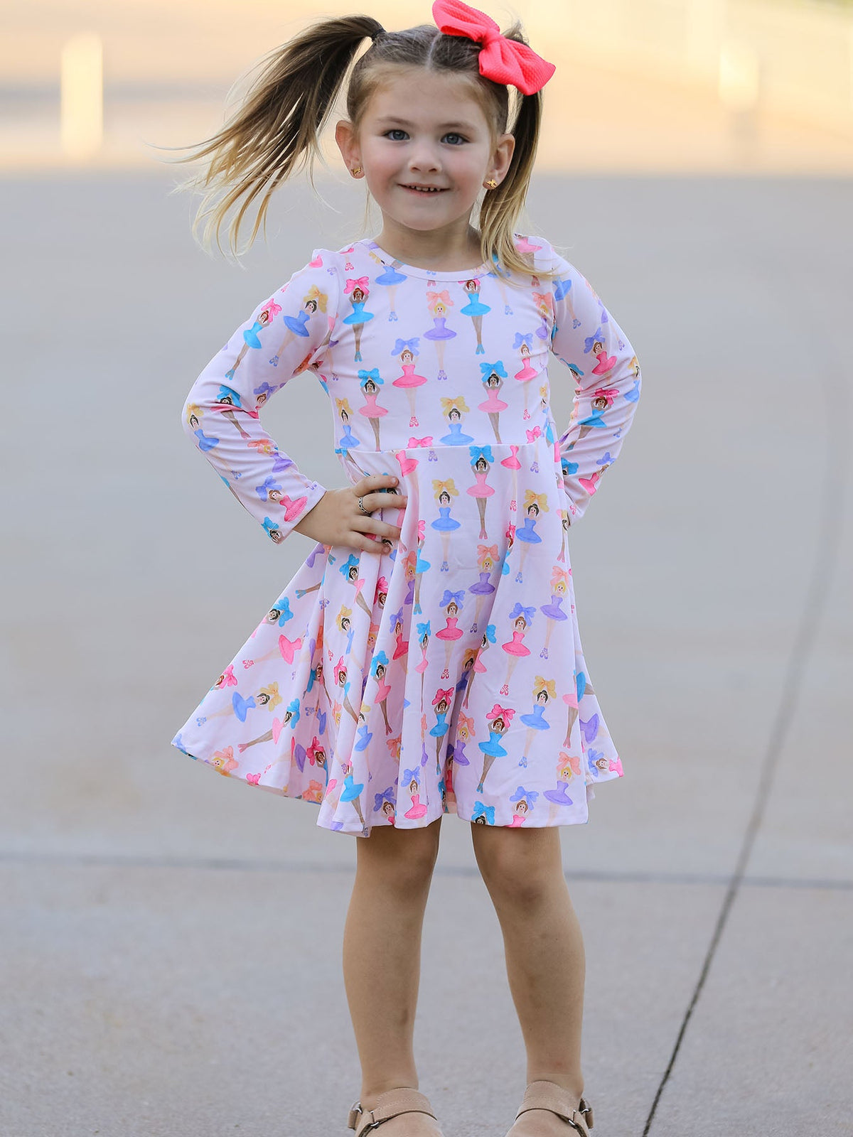 a girl with her hands on her hips
