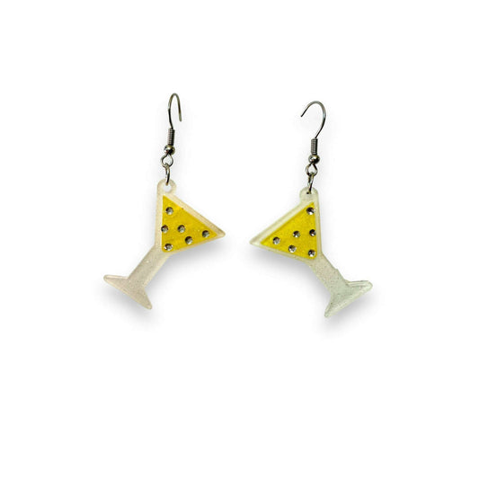 a pair of earrings with a yellow and white drink