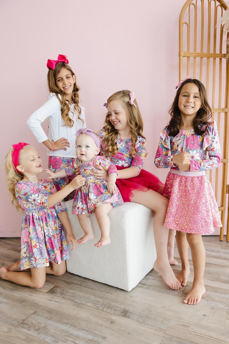 a group of girls posing for a picture