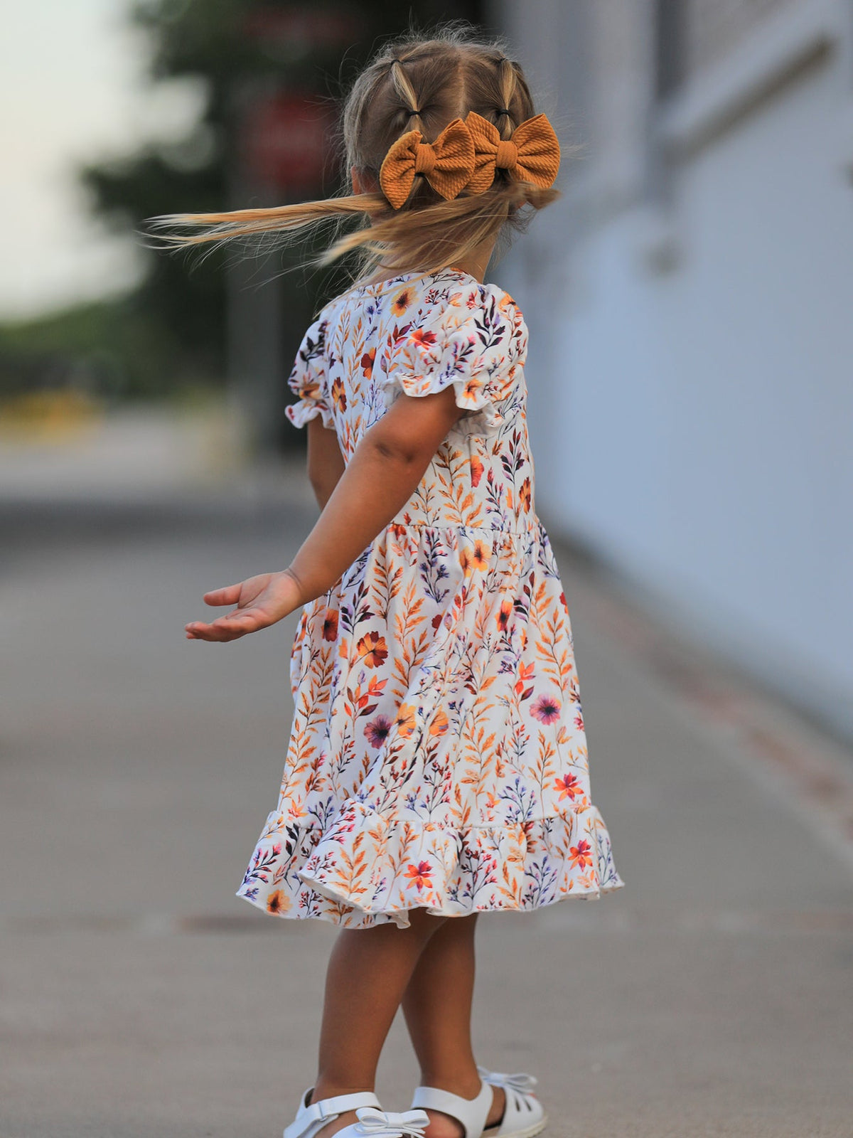 a girl in a dress