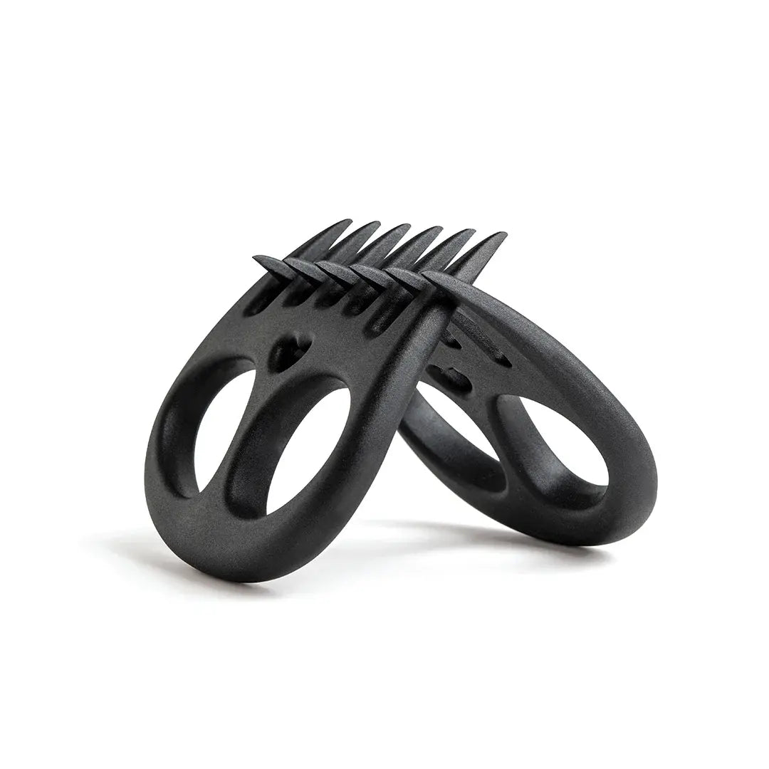 a black hair clip with spikes