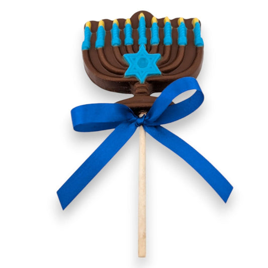 a chocolate candy with a blue bow