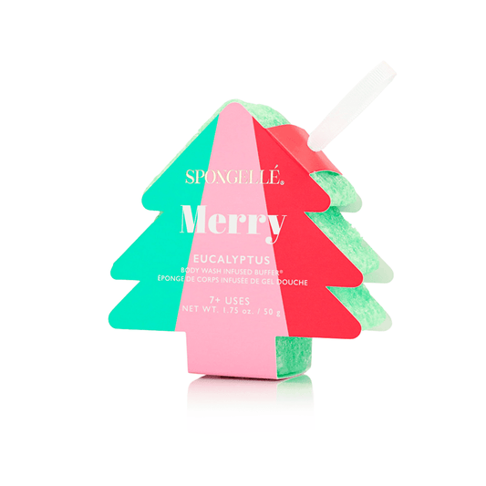a green and pink sponge in a shape of a christmas tree