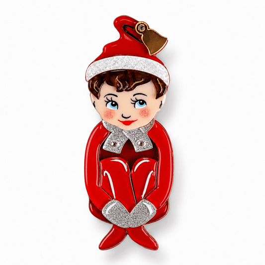 a red and silver christmas elf pin